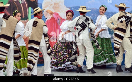 Traditional dancers perform as The Prince of Wales and The Duchess of Cornwall receive an official welcome by the Governor Rodrigo Medina and First Lady Gretta Selinas de Medina of Nuevo Leon at the Parque Fundidora, Monterrey in Mexico, on the ninth day of the Prince of Wales and Duchess of Cornwall's tour to Colombia and Mexico. Stock Photo