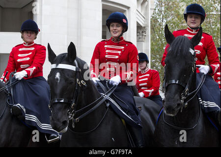Members of the First Aid Nursing Yeomanry ride sidesaddle parade through the City of London during the Lord Mayor's Show. Stock Photo