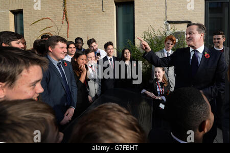 Prime Minister David Cameron speaks to pupils of Strood Academy in Rochester, Kent, where he toured the school with the Conservative candidate for Rochester and Strood, Kelly Tolhurst, prior to the forthcoming by-election on November 20. Stock Photo