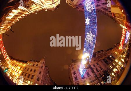 The Christmas lights on Regents Street, in central London, after pop group Busted switched on the lights after performing three of their songs as part of the aftershow event for the premiere of the Disney/Pixar animated movie The Incredibles. Stock Photo