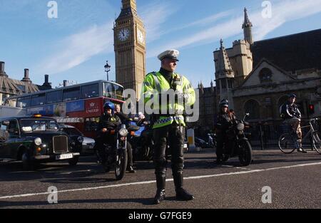 A two-minute silence is observed in Parliament Square, London, to mark Armistice Day which this year coincides with the royal opening of the Field of Remembrance at Westminster Abbey. Stock Photo