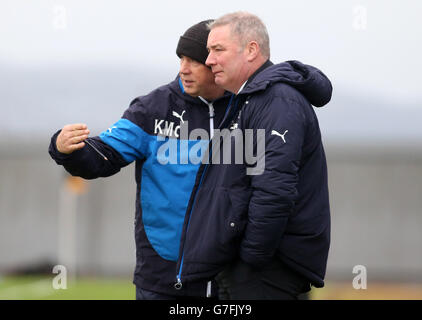 Rangers manager Ally McCoist (right) and assistant manager Kenny McDowall during the William Hill Scottish Cup match at the Bet Butler Stadium, Dumbarton. Stock Photo