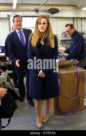 Prime Minister David Cameron with Kelly Tolhurst, Conservative Candidate for Rochester and Strood, talk to Mick Parks, visit MCL Mechanical near Rochester, Kent, during a constituency visit ahead of the forthcoming by-election later this week. Stock Photo