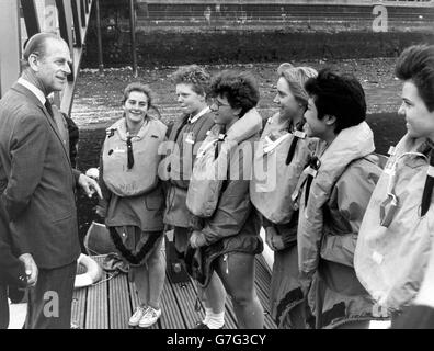 The Duke of Edinburgh chatting with some of the youngsters who learn boating skills at the Westminster Boating Base in London. *Scanned low-res from print, high-res available on request* Stock Photo