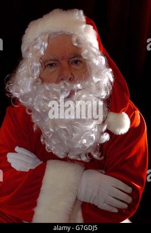 Phillip Mead, 66, poses at his home in Norwich after he was sacked from his job as Santa Claus for having the wrong attitude, following a disagreement with department store John Lewis. Mr Mead was asked to leave on Saturday following a row with store managers. Stock Photo