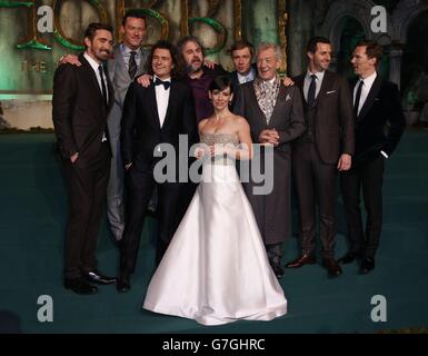 Cast members (left to right) Lee Pace, Luke Evans, Orlando Bloom, director Peter Jackson, Evangeline Lilly, Martin Freeman, Sir Ian McKellen, Richard Armitage, and Benedict Cumberbatch on the green carpet for the premiere of The Hobbit: Battle of the Five Armies, at the Odeon Leicester Square in central London. Stock Photo