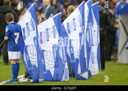 The Birmingham City match day mascots hold the club flags before the game. Stock Photo