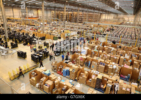 Amazon UK Fulfilment Centre - Peterborough. Workers on the warehouse floor at the Amazon UK Fulfilment Centre in Peterborough, Cambridgeshire. Stock Photo