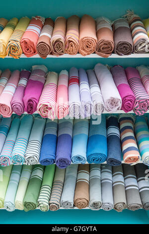 colourful display of fouta towels sarongs (also known as Hammam, turkish or peshtemal towels) outside a shop in Greece Stock Photo