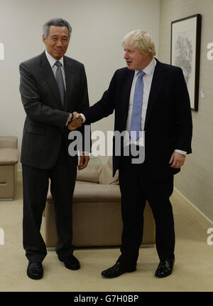 London Mayor Boris Johnson meets Russian dancers at City Hall in London ...