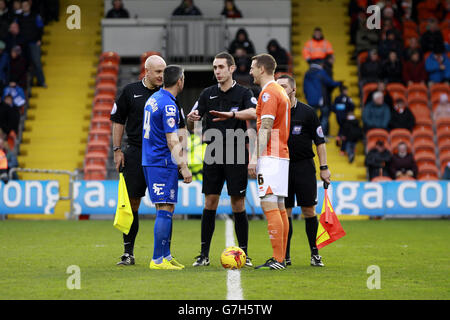 Soccer - Sky Bet Championship - Blackpool v Birmingham City - Bloomfield Road. Blackpool's Peter Clarke (right) and Birmingham City's Paul Robinson (left) receiving instructions from match day referee David Coote. Stock Photo
