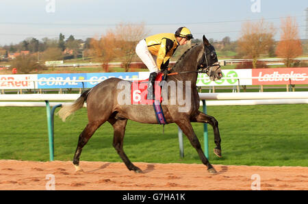 Horse Racing - Southwell Racecourse. Sam Spade ridden by Patrick Mathers goes to post Stock Photo