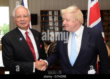 Mayor of London Boris Johnson (right) meets with Malaysian Prime Minister, the Honourable Dato' Sri Mohd Najib bin Tun Abdul Razak at his office near Kuala Lumpur in Malaysia. Stock Photo