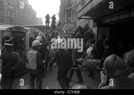 On oxygen and a drip, one of the injured in the Tube crash at Moorgate station is carried to a waiting ambulance. Stock Photo