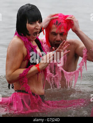 Swimmers take part in the Loony Dook New Year's Day dip in the Firth of Forth at South Queensferry, as part of Edinburgh's Hogmanay celebrations. Stock Photo