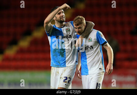 Blackburn Rovers' winning goalscorer Chris Taylor (right) and Shane Duffy (left) celebrate after the match Stock Photo