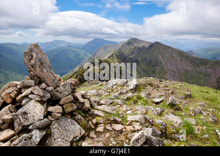 View west on Aonach Eagach (Notched Ridge) seen from Meall Dearg mountain summit cairn in summer in Scottish Highlands. Glencoe Highland Scotland UK Stock Photo
