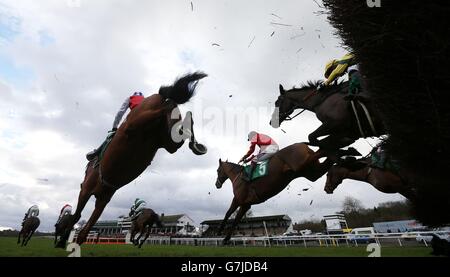 Eventual winner Cogry (centre No.5), ridden by Sam Twiston-Davies, jumps the last first time round in the coral.co.uk Money Back If Your Horse Falls Novices' Limited Handicap Chase during Coral Welsh Grand National Day at Chepstow Racecourse, Chepstow. Stock Photo