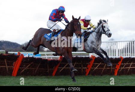 Eventual winner Awaywiththegreys (right), ridden by Sean Bowen, jumps the last with Hansupfordetroit, ridden by Robert Williams, in the Coral Proud Supporters Of British Horse Racing Handicap Hurdle during Coral Welsh Grand National Day at Chepstow Racecourse, Chepstow. Stock Photo