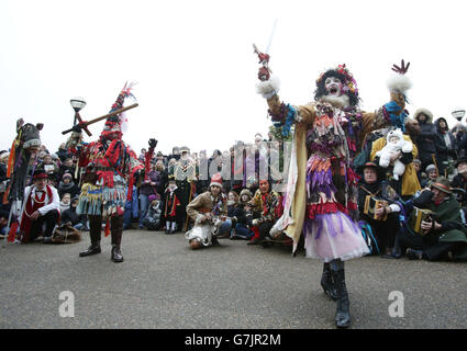 Performers taking part in the Twelfth Night annual seasonal celebration, at Bankside in London. Stock Photo