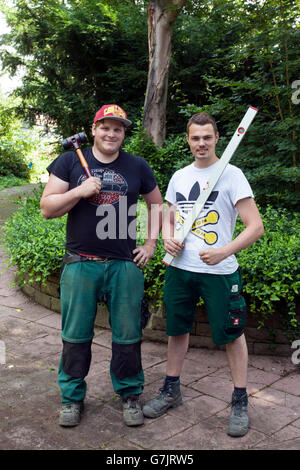 Pavement workers with their tools Stock Photo