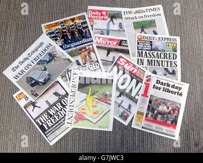 The front pages of the UK national newspapers and how they covered the terror attack on French satirical magazine Charlie Hebdo in Paris, in which 12 people died. Stock Photo