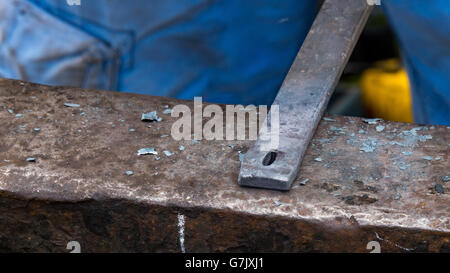 Detailed shot of metal being worked at a blacksmith forge Stock Photo