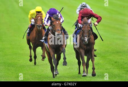 Sir Isaac Newton ridden by Ryan Moore (left) beats Chemical Charge ridden by Colin Keane to win the Volvo International Stakes during day three of the Dubai Duty Free Irish Derby Festival at Curragh Racecourse, Co. Kildare, Ireland. Stock Photo