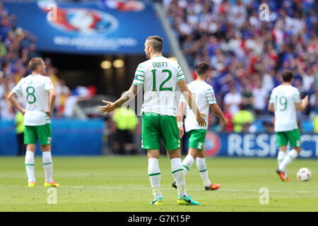 Republic of Ireland's Shane Duffy shows his dejection after France's Antoine Griezmann (not pictured) scores his sides second goal of the game during the round of 16 match at the Stade de Lyon, Lyon. Stock Photo