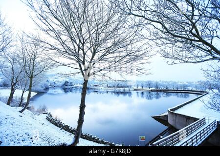 Day breaks over Tegg's Nose Reservoir, Langley near Macclesfield as forecasters are predicting the coldest night in Britain so far this winter. Stock Photo