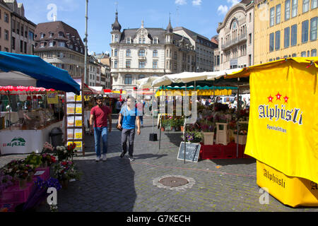 The City Market, held daily on Marktplatz in the city center, features an abundance of fruit and vegetables, flowers, and meats. Stock Photo