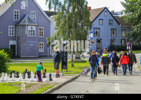 People on a pedestrian street in the city of Tromsø, Norway. Stock Photo