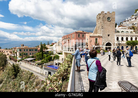 Tourists at the main plaza of Taormina at the island Sicily, Italy Stock Photo