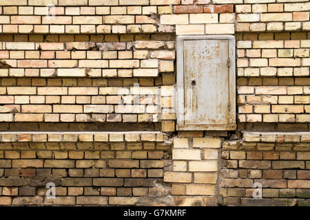 Old brick and stones wall fragment horizontal lines background texture Stock Photo