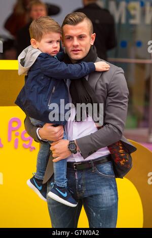 Jack Wilshere and his son Archie arriving at a screening of Peppa Pig: The Golden Boots at the Odeon cinema, in Leicester Square, London. Stock Photo