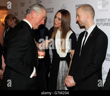 The Prince of Wales meets Melanie Chisholm (2nd right) as he attends the annual Prince's Trust 'Invest In Futures' reception at the Savoy Hotel in London. Stock Photo