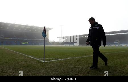 Ground staff prepare the Turf Moor pitch before the Barclays Premier League match at Turf Moor, Burnley. Stock Photo