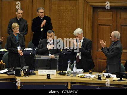 The Archbishop of Canterbury the Most Rev Justin Welby (right), applauds the Archbishop of the Chaldean Diocese of Erbil, Iraq, Bashar Warda (centre), after he addressed members of the synod during the opening day of the General Synod at Church House, London. RESS ASSOCIATION Photo. Picture date: Tuesday February 10, 2015. See PA story RELIGION Synod. Photo credit should read: Nick Ansell/PA Wire Stock Photo