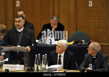 The Archbishop of Canterbury the Most Rev Justin Welby (right), watches as the Archbishop of the Chaldean Diocese of Erbil, Iraq, Bashar Warda (left), gives an address during the opening day of the General Synod at Church House, London. RESS ASSOCIATION Photo. Picture date: Tuesday February 10, 2015. See PA story RELIGION Synod. Photo credit should read: Nick Ansell/PA Wire Stock Photo
