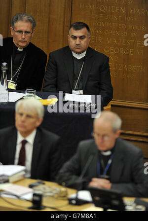 The Archbishop of the Chaldean Diocese of Erbil, Iraq, Bashar Warda (centre back), sits behind the Archbishop of Canterbury the Most Rev Justin Welby (right), as he waits to give an address during the opening day of the General Synod at Church House, London. RESS ASSOCIATION Photo. Picture date: Tuesday February 10, 2015. See PA story RELIGION Synod. Photo credit should read: Nick Ansell/PA Wire Stock Photo