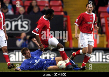 Soccer - FA Cup - Third Round - Charlton Athletic v Rochdale. Charlton Athletic's Jason Euell is tackled by Rochdale's Paul Tait (floor) Stock Photo