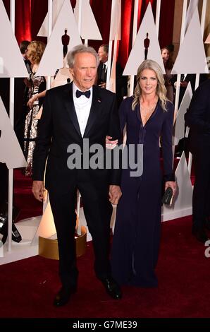 Clint Eastwood and Christine Sandera arriving at the 87th Academy