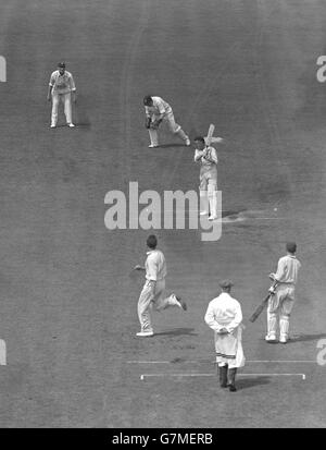 Nottinghamshire batsman Walter Keeton misses a ball from Surrey bowler Maurice Allom. The Surrey wicketkeeper Edward Brooks. Stock Photo