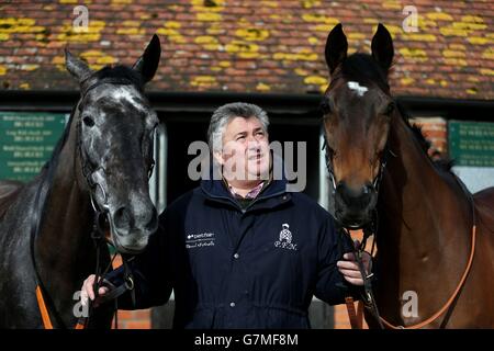 Trainer Paul Nicholls pictured with Saphir Du Rheu and Zarkandar during the visit to Manor Farm Stables, Ditcheat. Stock Photo