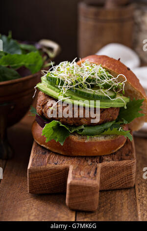 Grilled vegan bean burger with greens Stock Photo