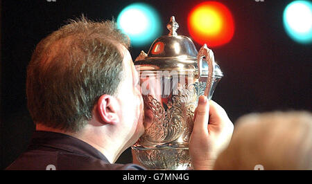 Raymond van Barneveld celebrates his victory against Martin Adams. Stock Photo