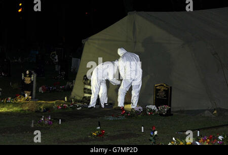 The scene in a cemetery in Shildon, near Bishop Auckland, in the early hours of Wednesday, where police have exhumed the body of a middle aged man. The move follows a review of the practice records at the surgery of 70-year-old Dr Howard Martin at Newton Aycliffe, County Durham. Stock Photo