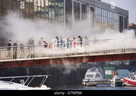 Japanese artist Fujiko Nakaya creates a fog bridge across Bristol harbourside to celebrate the city's status as European Green Capital. Stock Photo