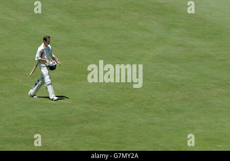 England captain Michael Vaughan leaves the field after being caught by South Africa's Jacques Rudolph. Stock Photo