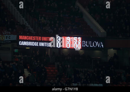 Soccer - FA Cup - Fouth Round - Replay - Manchester United v Cambridge United - Old Trafford. A general view of the scoreboard at Old Trafford. Stock Photo